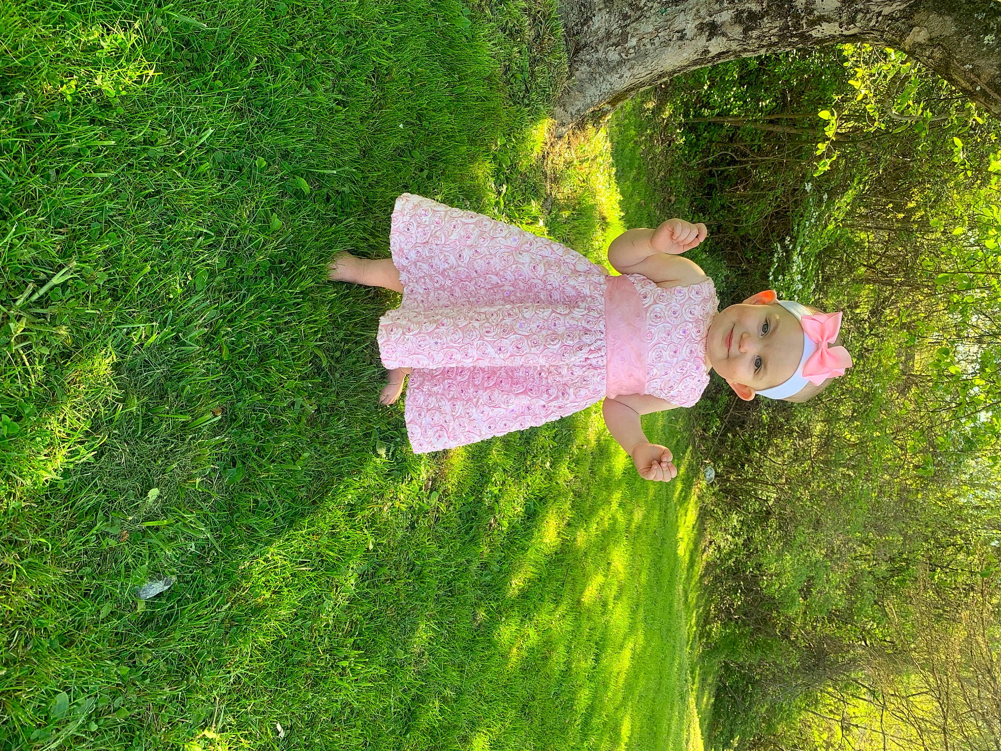 Amelia is registered to the contest to win money with this photo: botany, dress, fun, garden, grass, grass_family, grassland, groundcover, happy, headwear, joy, landscape, lawn, leisure, meadow, people_in_nature, person, petal, plant, shrub