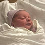 Paisley joined the competition — help win amazing prizes! newborn, baby, sleeping, blanket, swaddled, hat, infant, cozy, soft, cute, child, portrait, indoors, peaceful, resting, human, wrapped, headwear, skin, closeup