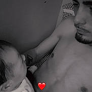 Zélya a rejoint le concours — aidez-le/la à gagner de superbes lots ! affection, arm, baby, black_and_white, child, closeup, expression, face, head, heart_emoji, holding, human, indoor, intimacy, love, man, portrait, shirtless, skin, tattoo