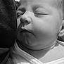 baby, sleeping, closeup, black_and_white, newborn, infant, face, peaceful, portrait, soft, cuddle, person, skin, clothing, rest, young, head, expression, calm, comfort