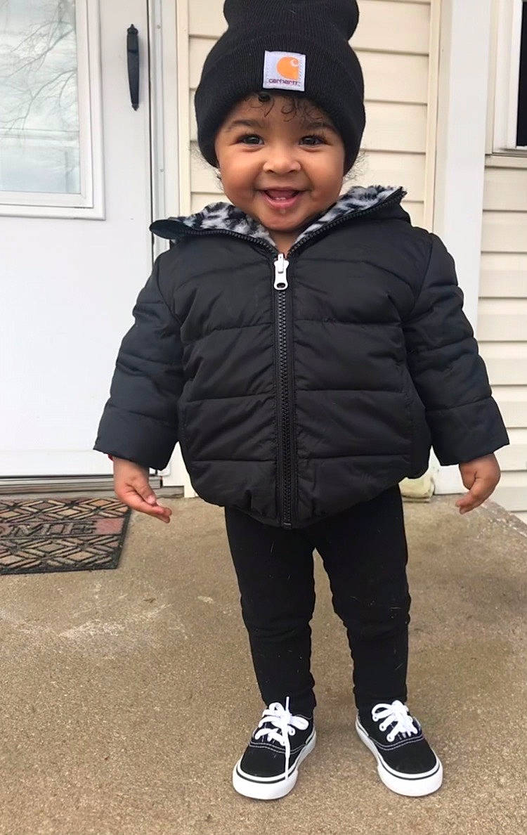 Maylani is registered to the contest to win money with this photo: black, cap, cheek, clothing, cool, eye, face, facial_expression, happy, head, headwear, jacket, joy, outerwear, people, person, photograph, shoe, sleeve, smile