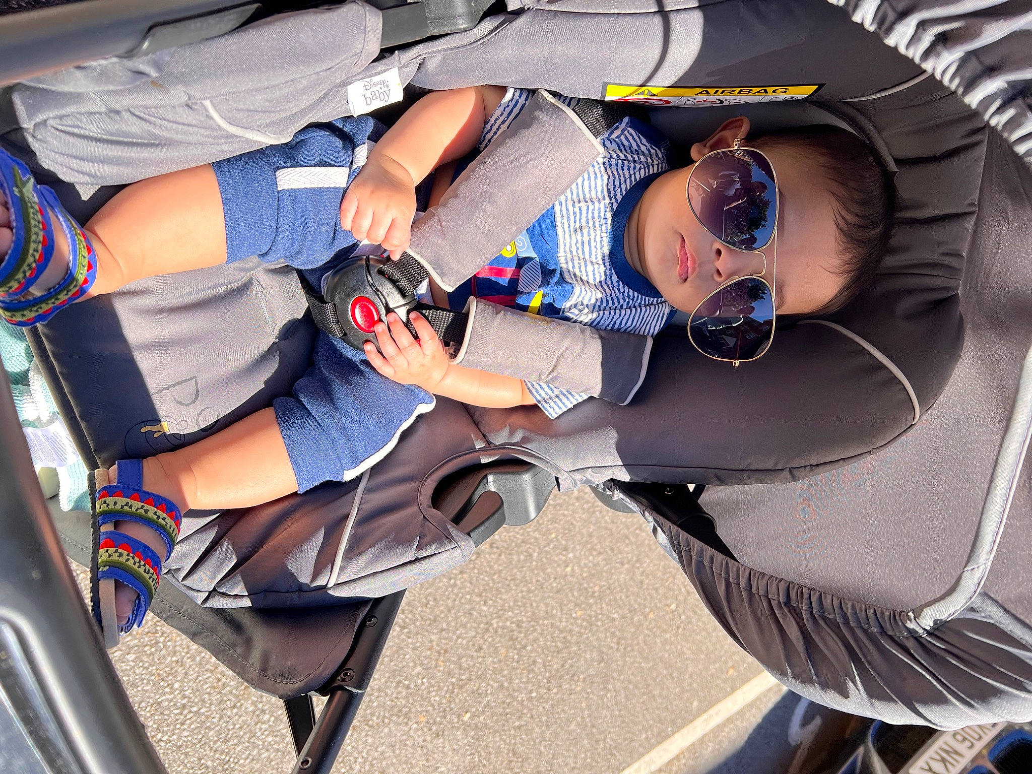 Rishank is registered to the contest to win money with this photo: auto_part, automotive_design, comfort, cool, elbow, electric_blue, eyewear, glasses, goggles, human_leg, joint, knee, lap, leg, mouth, person, personal_protective_equipment, shorts, street_fashion, sunglasses