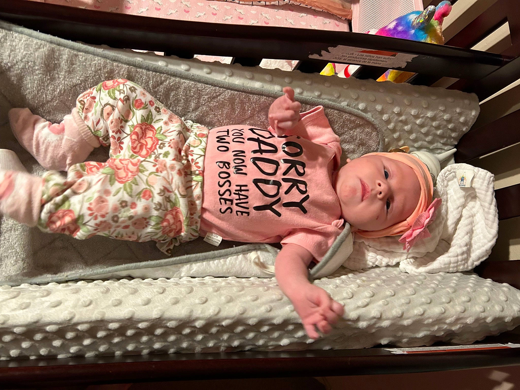 Kinley joined the competition — help win amazing prizes! baby, baby_toddler_clothing, child, comfort, flooring, fun, head, headgear, headwear, human_leg, leisure, mammal, pattern, person, pink, product, sitting, skin, sleeve, smile