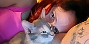 Babygirl is registered to the contest to win money with this photo: animal, baby, bodypart, canine, cat, couch, dog, face, finger, furniture, hand, head, husky, kitten, person, pet, photography, siamese, skin, tattoo