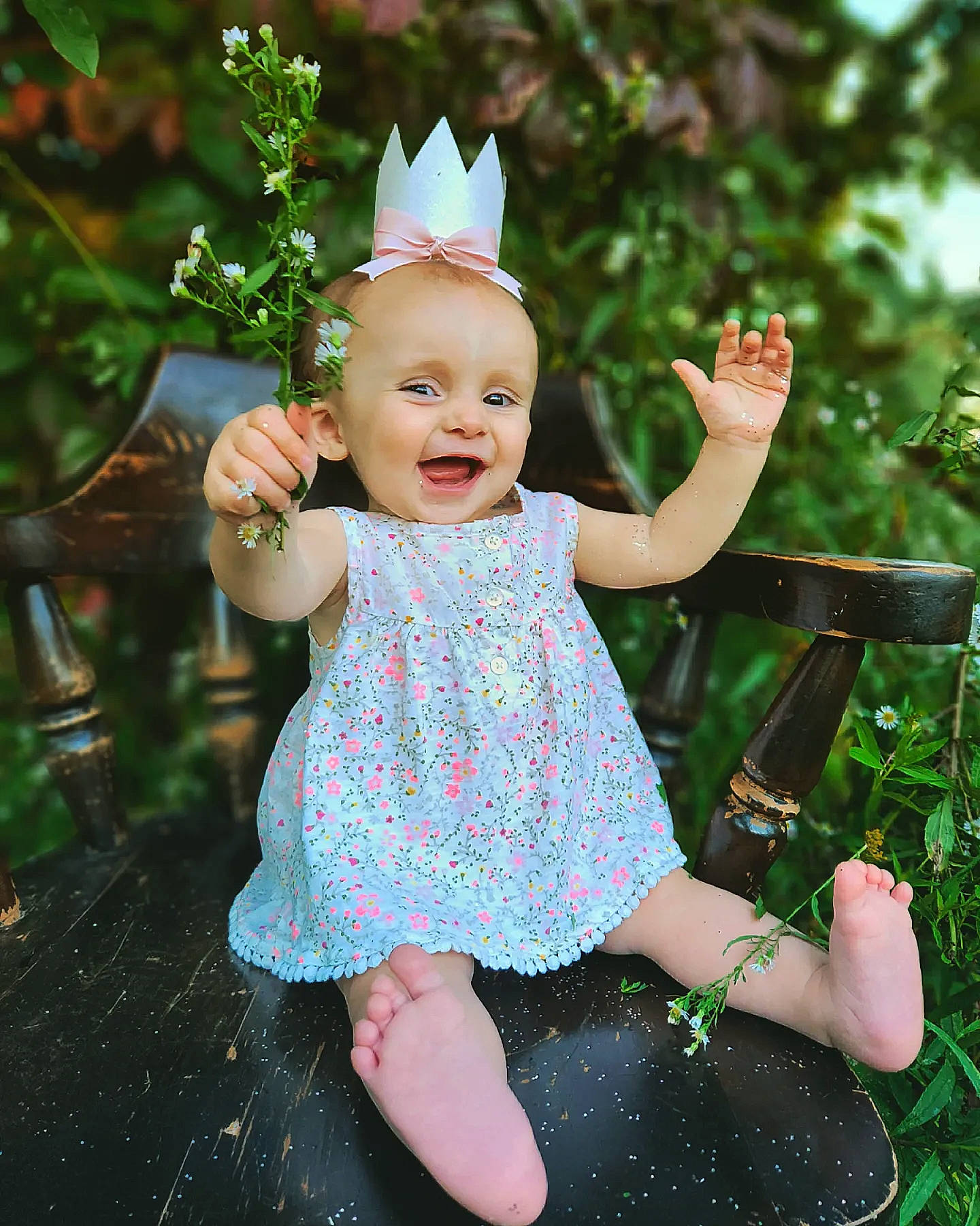 Natalia is registered to the contest to win money with this photo: baby_toddler_clothing, child, costume_hat, fashion_accessory, flash_photography, fun, grass, happy, head, headpiece, magenta, party_hat, party_supply, pattern, people_in_nature, person, pink, plant, purple, smile
