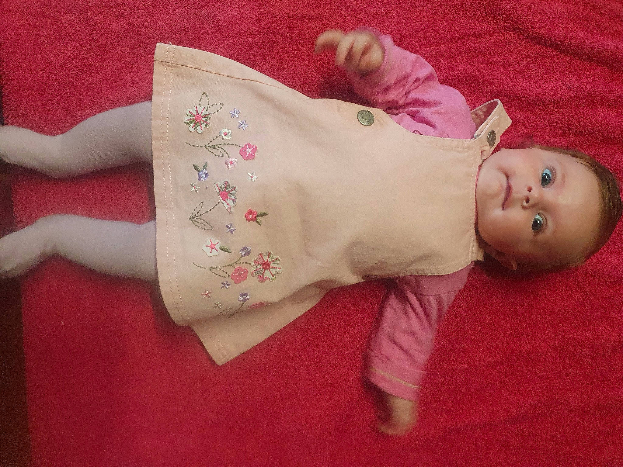 Lili participe au concours pour gagner de l'argent avec cette photo : abdomen, baby, baby_products, baby_toddler_clothing, baby_toys, carmine, cheek, child, doll, fashion_accessory, human_body, linens, magenta, pattern, peach, person, pink, skin, sleeve, toddler