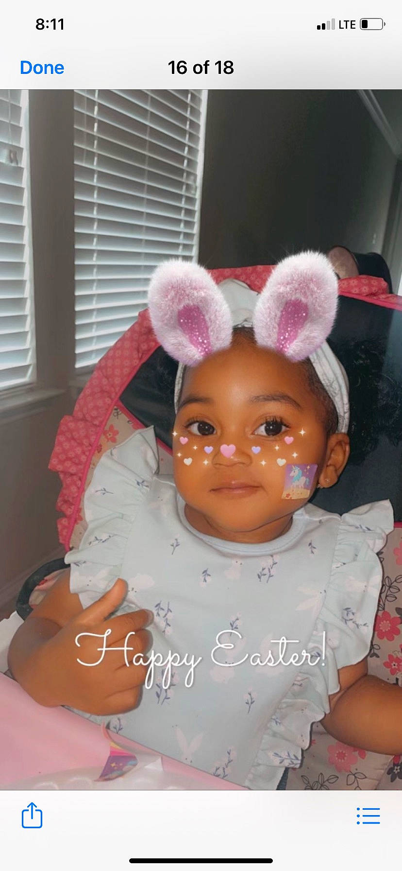 Annalise is registered to the contest to win money with this photo: cheek, child, doll, ear, eye, eyebrow, eyelash, fawn, happy, headpiece, human_body, iris, magenta, nose, party_supply, person, pink, skin, toy, window