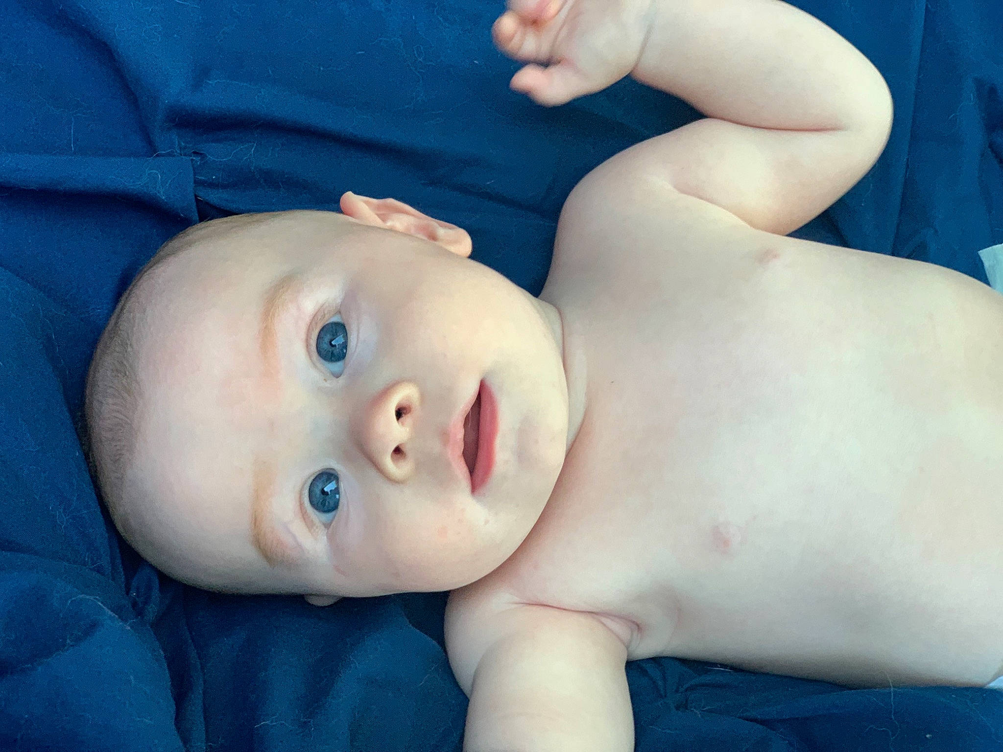 Oliver is registered to the contest to win money with this photo: abdomen, baby, baby_toddler_clothing, blue, cheek, chest, eye, eyebrow, eyelash, flash_photography, happy, head, iris, lip, mouth, nose, person, skin, stomach, toddler
