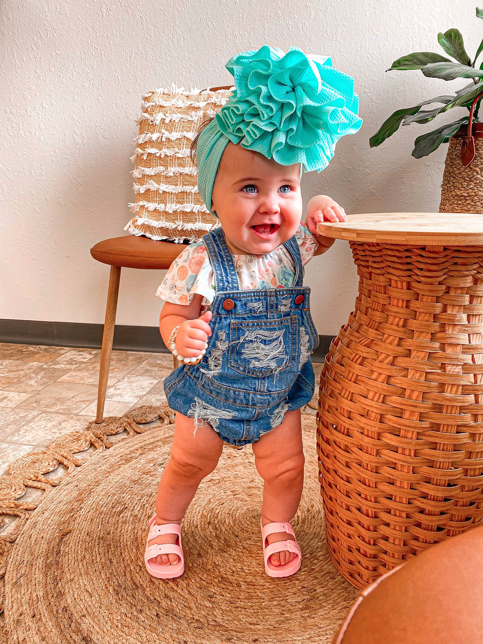 Juliette joined the competition — help win amazing prizes! baby, baby_toddler_clothing, basket, child, costume_hat, facial_expression, fashion_accessory, flowerpot, fun, hairstyle, happy, hat, headpiece, headwear, human_leg, party_supply, pattern, person, plant, sitting