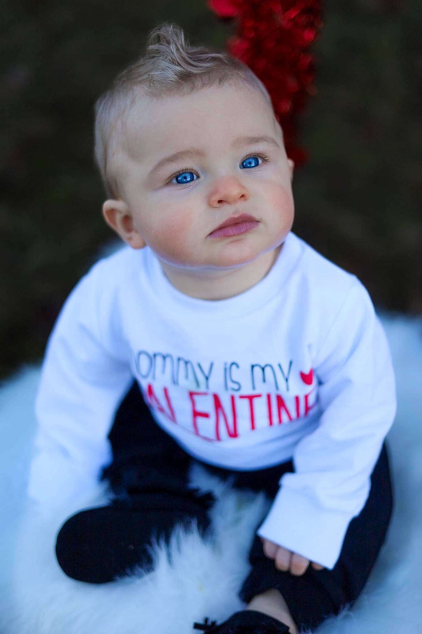Daxton is registered to the contest to win money with this photo: baby, baby_toddler_clothing, cheek, eye, eyebrow, face, fun, grass, hair, happy, head, headgear, human_body, iris, lip, neck, person, sleeve, smile, t_shirt