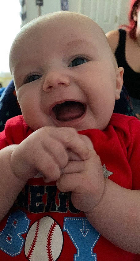 Cason joined the competition — help win amazing prizes! baby, baby_laughing, baby_toddler_clothing, cheek, child, event, finger, flag_of_the_united_states, fun, gesture, happy, iris, lip, mouth, nail, nose, person, skin, smile, thumb