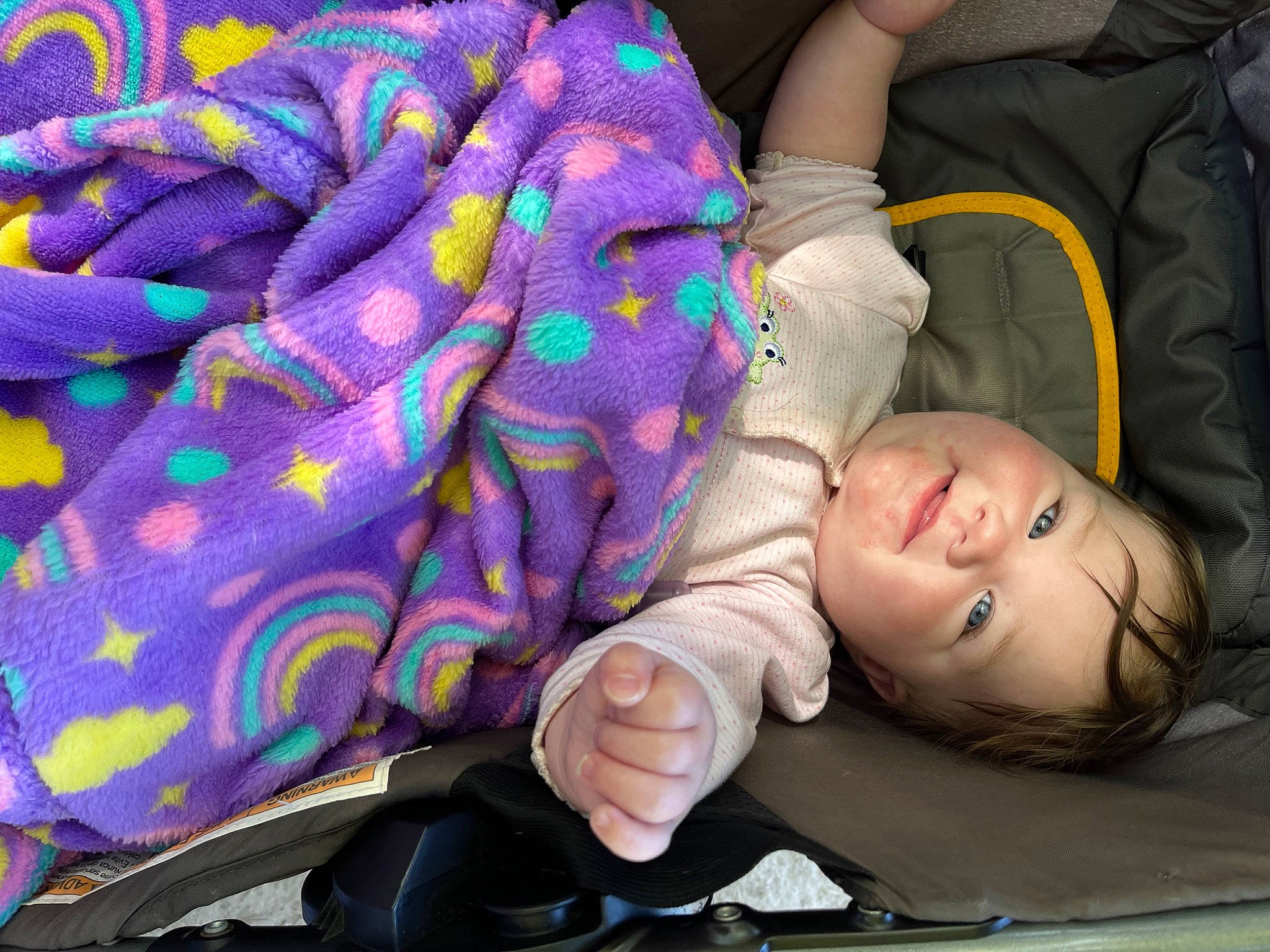 Annalise joined the competition — help win amazing prizes! arm, baby_products, child, comfort, electric_blue, fashion_accessory, fun, hairstyle, hand, magenta, nail, pattern, person, purple, sitting, thread, toddler, tree, violet, visual_arts