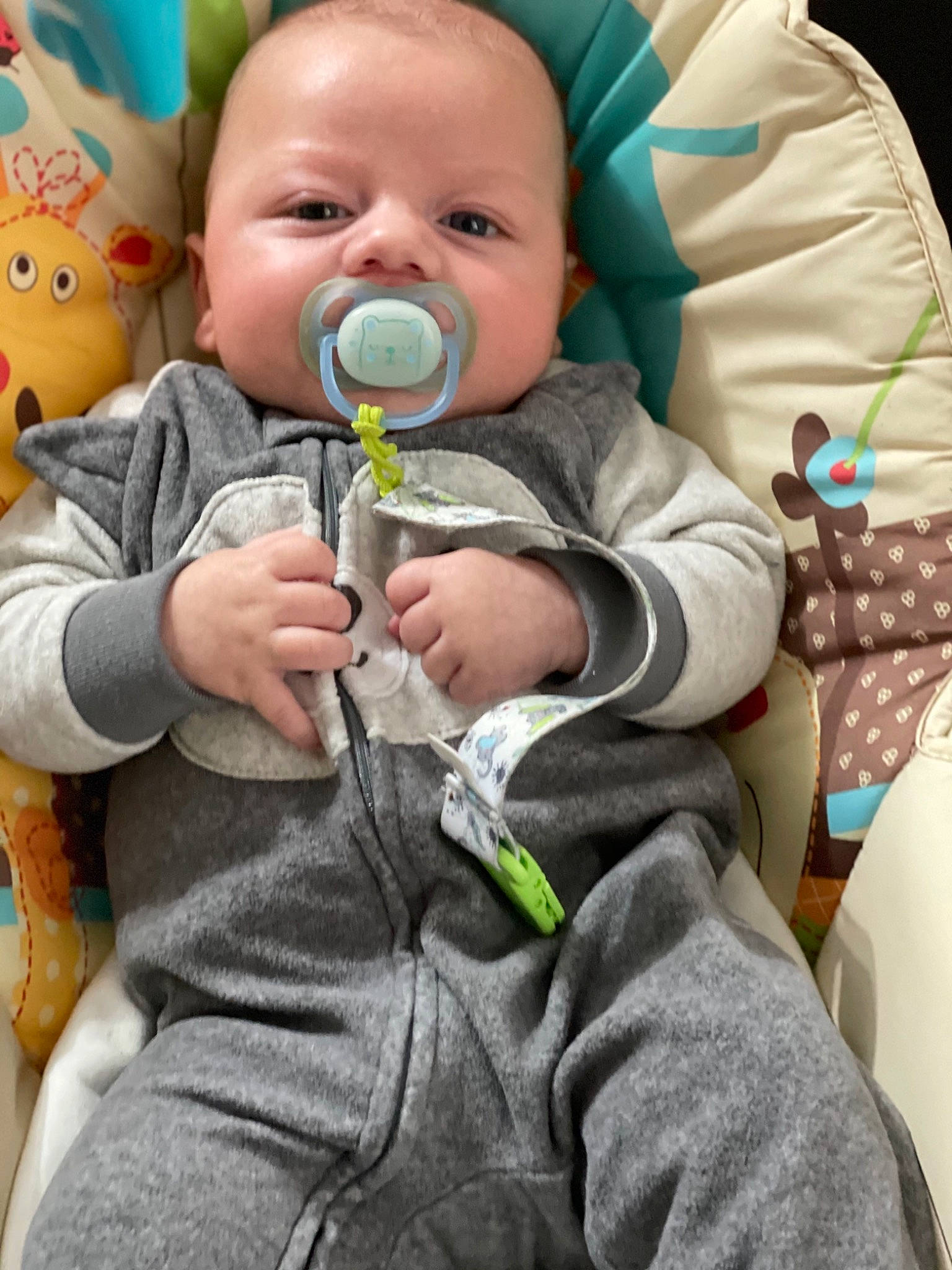 Noah participe au concours pour gagner de l'argent avec cette photo : baby, baby_toddler_clothing, cheek, child, comfort, eye, face, gesture, grass, happy, head, iris, mouth, nose, outerwear, person, product, skin, sleeve, smile