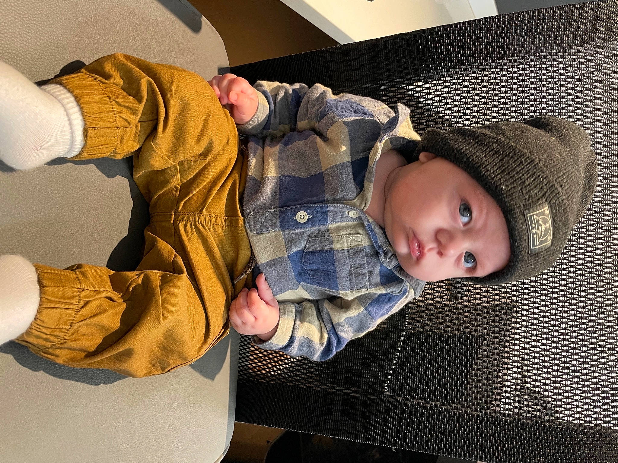 Noah participe au concours pour gagner de l'argent avec cette photo : baby, baby_toddler_clothing, child, comfort, flooring, fun, gesture, headgear, headwear, knee, outerwear, pattern, person, product, room, shoe, sitting, sleeve, sneakers, toddler