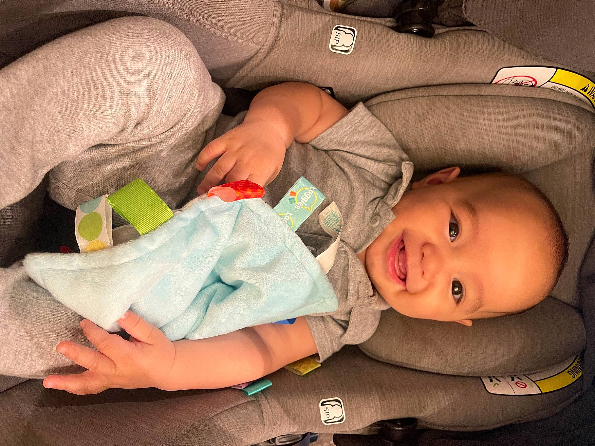 Maximus joined the competition — help win amazing prizes! arm, baby, baby_carriage, baby_products, baby_toddler_clothing, cheek, comfort, elbow, facial_expression, finger, fun, hand, happy, head, joint, mouth, orange, organ, person, smile