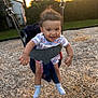 Xavier joined the competition — help win amazing prizes! toddler, child, swing, playground, outdoor, smiling, happy, sunset, grass, woodchips, clothing, shorts, socks, baby, fun, daylight, nature, person, park, summer