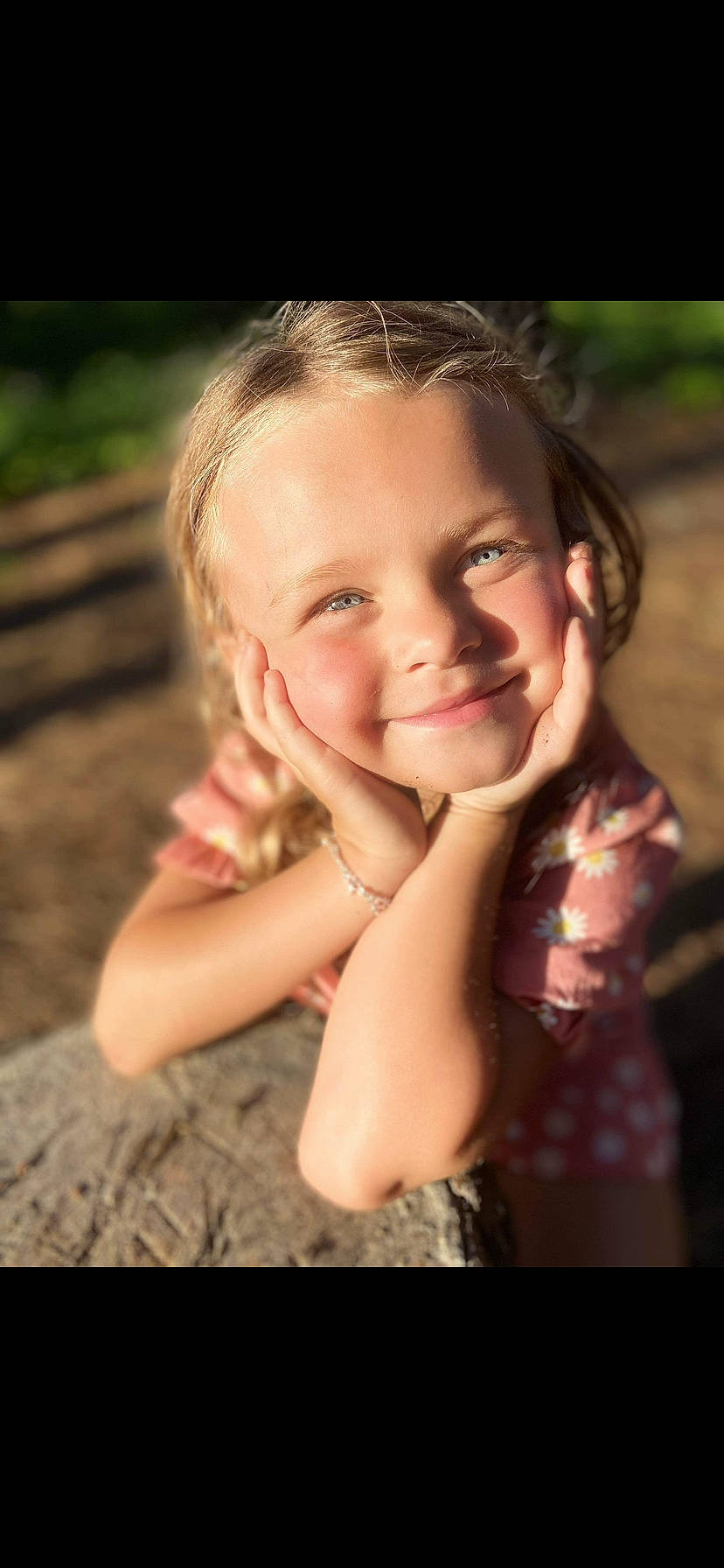 Aubrey is registered to the contest to win money with this photo: arm, cheek, chin, face, flash_photography, gesture, grass, hand, happy, iris, joy, lip, long_hair, nose, people_in_nature, person, plant, shoulder, skin, smile