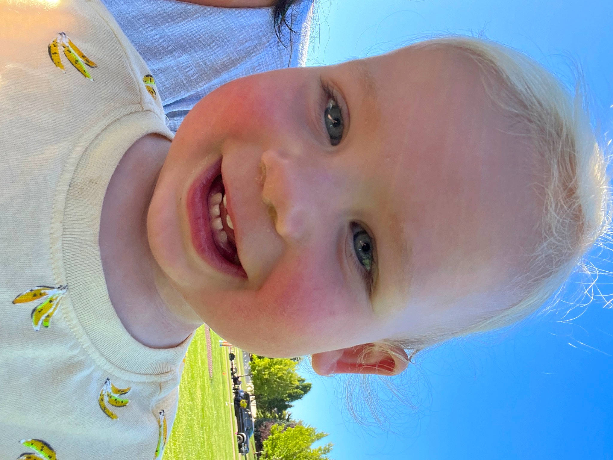 Callen is registered to the contest to win money with this photo: azure, baby, cheek, ear, eyebrow, facial_expression, fun, gesture, happy, human_body, iris, joy, lip, mouth, neck, nose, person, skin, sky, smile