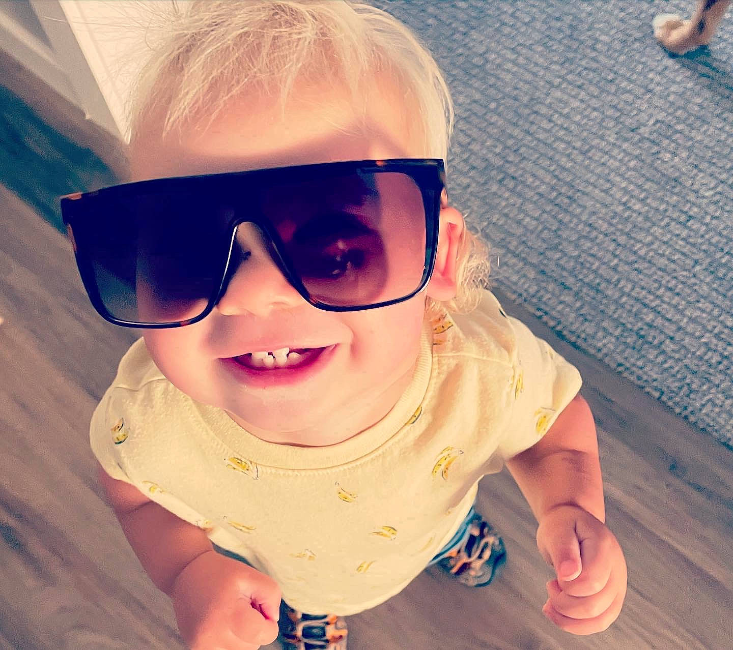 Callen is registered to the contest to win money with this photo: baby_toddler_clothing, cheek, cool, eye_glass_accessory, eyebrow, eyewear, finger, glasses, goggles, happy, headgear, joy, lip, mouth, nose, person, skin, sleeve, smile, sunglasses