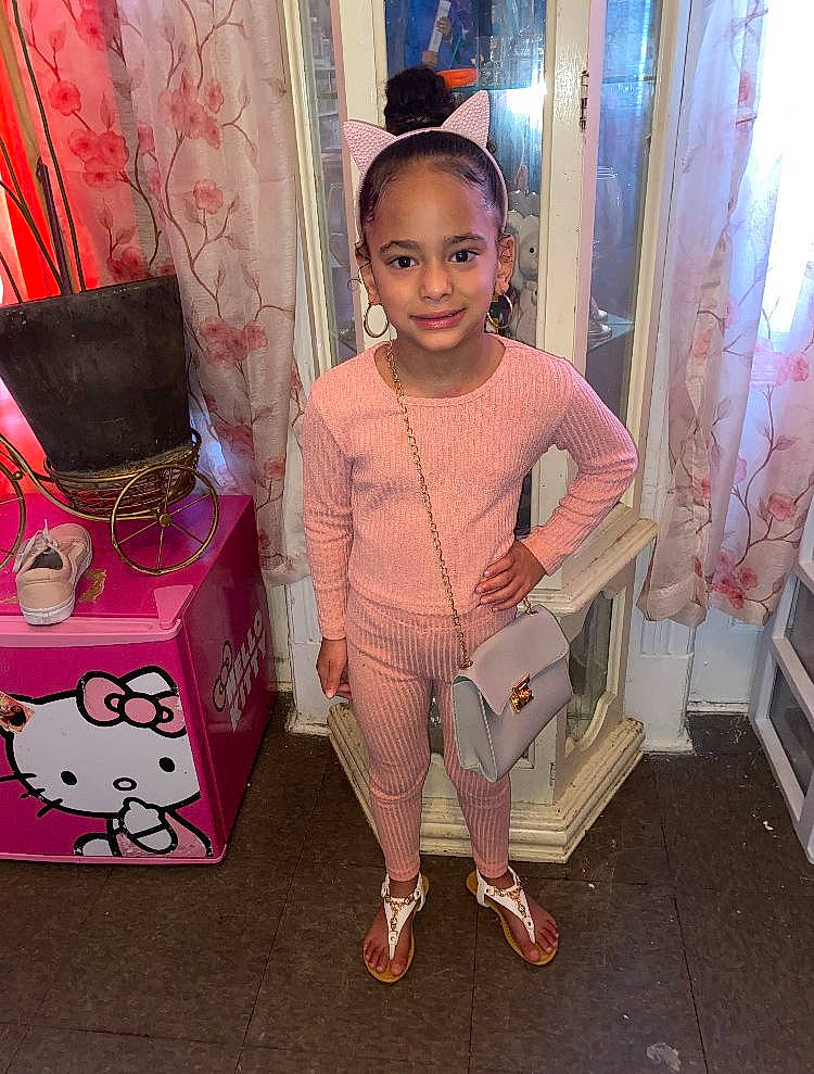 Britney joined the competition — help win amazing prizes! bag, child, curtain, door, eyewear, fashion_accessory, fashion_design, happy, jewellery, joy, luggage_and_bags, magenta, pattern, person, pink, room, sandal, shoe, sleeve, smile