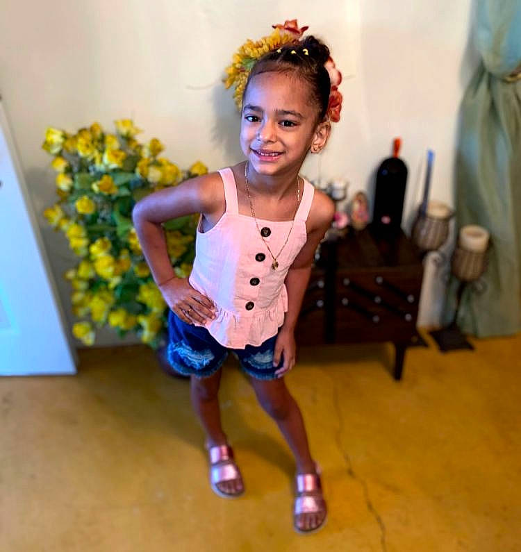 Britney is registered to the contest to win money with this photo: baby_toddler_clothing, child, costume, electric_blue, entertainment, event, fashion_accessory, fashion_design, flooring, flower, fun, happy, joy, leisure, pattern, performing_arts, person, play, room, sandal