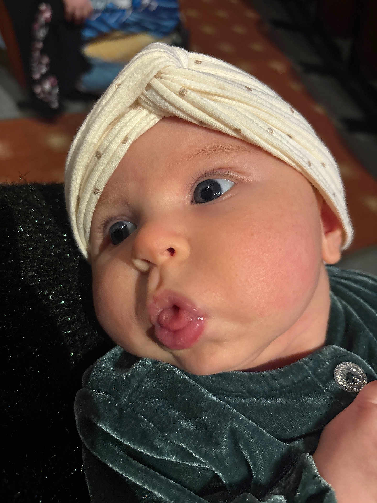 Emela joined the competition — help win amazing prizes! baby, closeup, face, headband, expression, pout, velvet_clothing, cute, infant, child, portrait, skin, eyes, mouth, hand, indoor, soft_texture, adorable, fashion, person