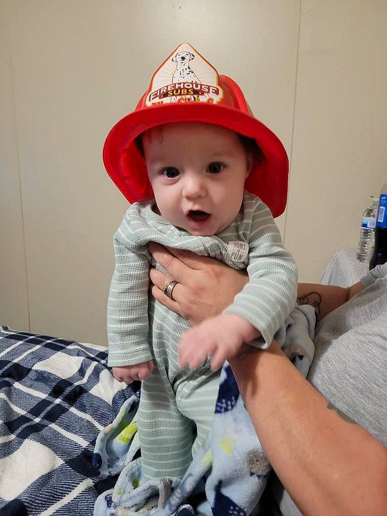 Wade joined the competition — help win amazing prizes! baby, baby_products, baby_toddler_clothing, baseball_cap, cap, carmine, comfort, costume_hat, fashion_accessory, fun, happy, hat, headwear, human_leg, pattern, person, personal_protective_equipment, plaid, play, sitting