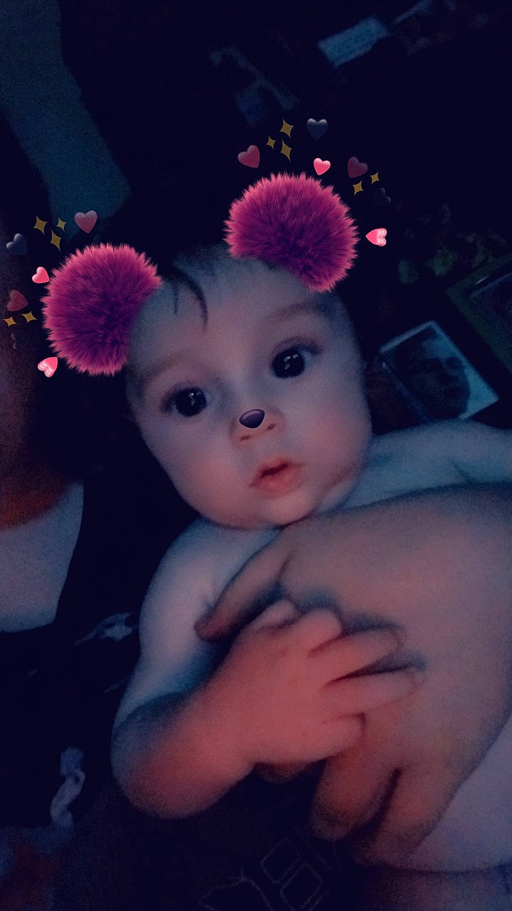 Wade joined the competition — help win amazing prizes! baby_toddler_clothing, black_hair, cheek, chin, ear, eye, eyebrow, eyelash, flash_photography, hand, happy, headgear, headpiece, headwear, human_body, iris, lip, neck, person, petal