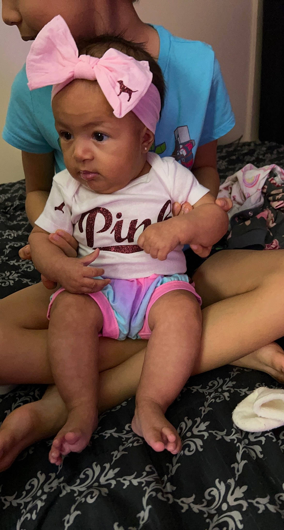 Armani is registered to the contest to win money with this photo: baby_toddler_clothing, baseball_cap, cap, cool, eye, facial_expression, fashion, finger, happy, hat, headgear, headwear, human_body, lap, leg, mouth, muscle, person, pink, shorts