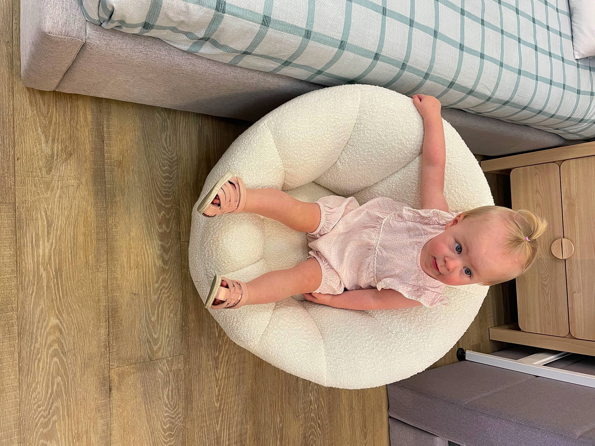 Hazel is registered to the contest to win money with this photo: abdomen, baby, baby_products, baby_safety, baby_sleeping, baby_toddler_clothing, child, comfort, finger, human_body, human_leg, infant_bed, knee, leg, linens, person, sitting, stomach, thigh, toddler