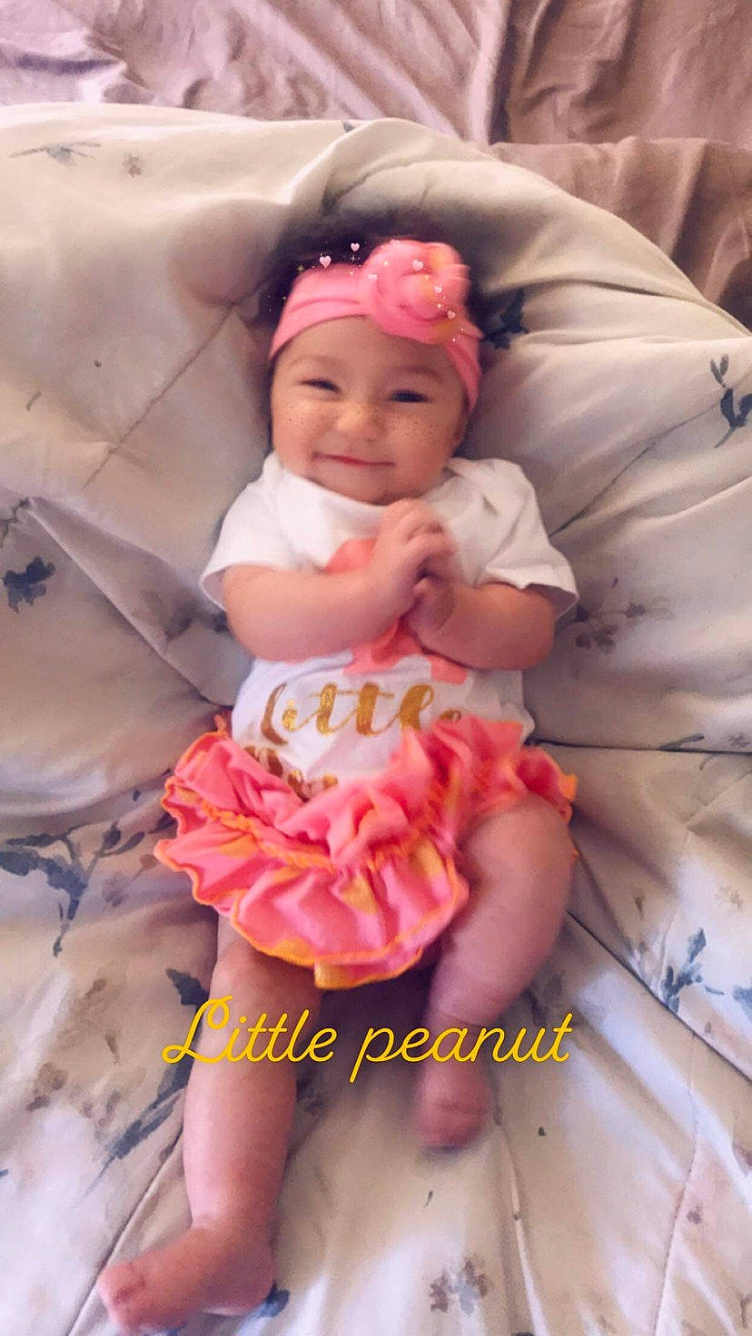 Huntleigh Tanner joined the competition — help win amazing prizes! baby, baby_toddler_clothing, child, hair_accessory, headband, headgear, headpiece, headwear, joy, peach, person, pink, smile, toddler