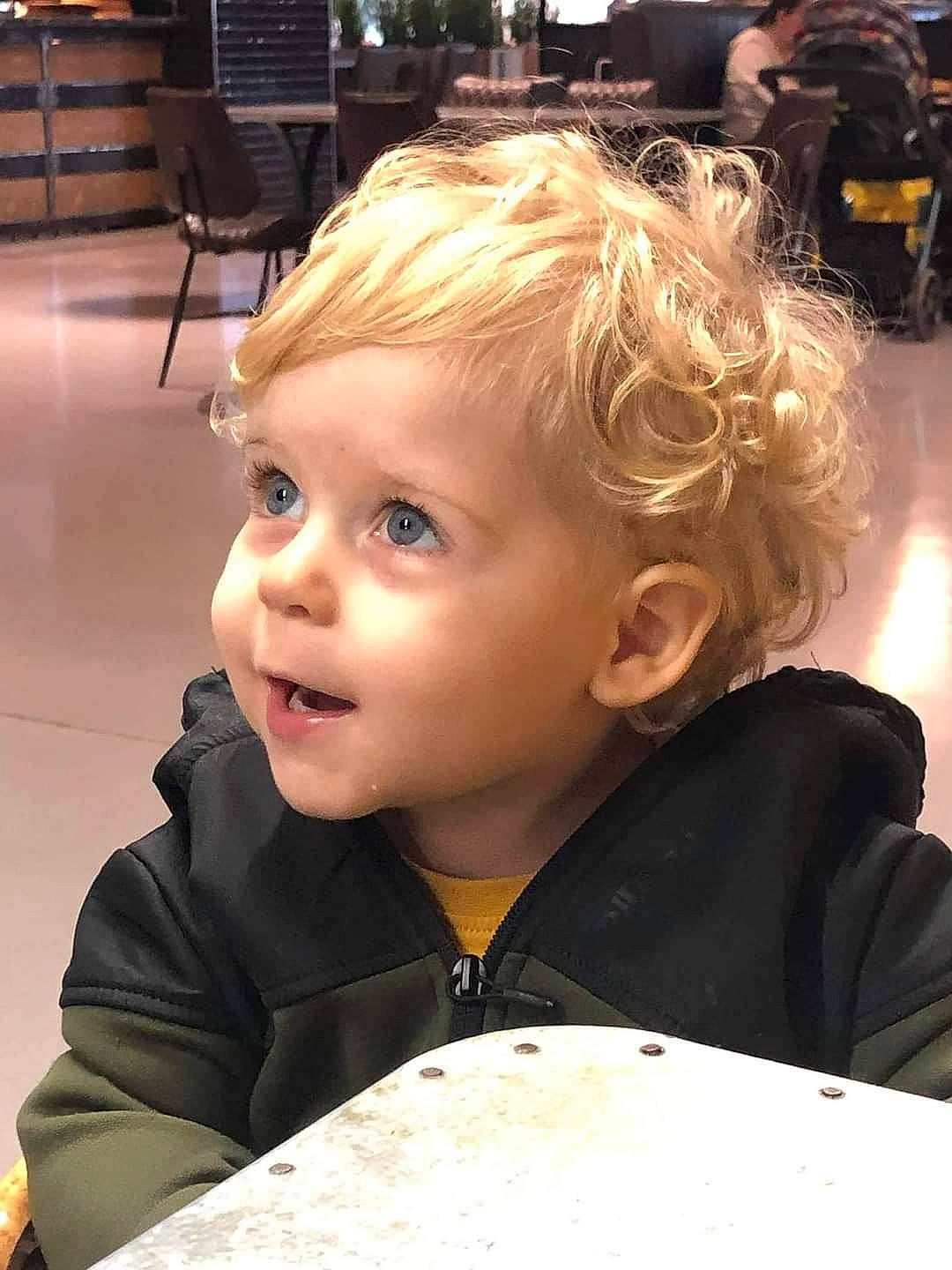 Leon joined the competition — help win amazing prizes! baby, blond, chair, cheek, child, chin, comfort_food, flooring, fun, happy, iris, person, sitting, smile, toddler, wood