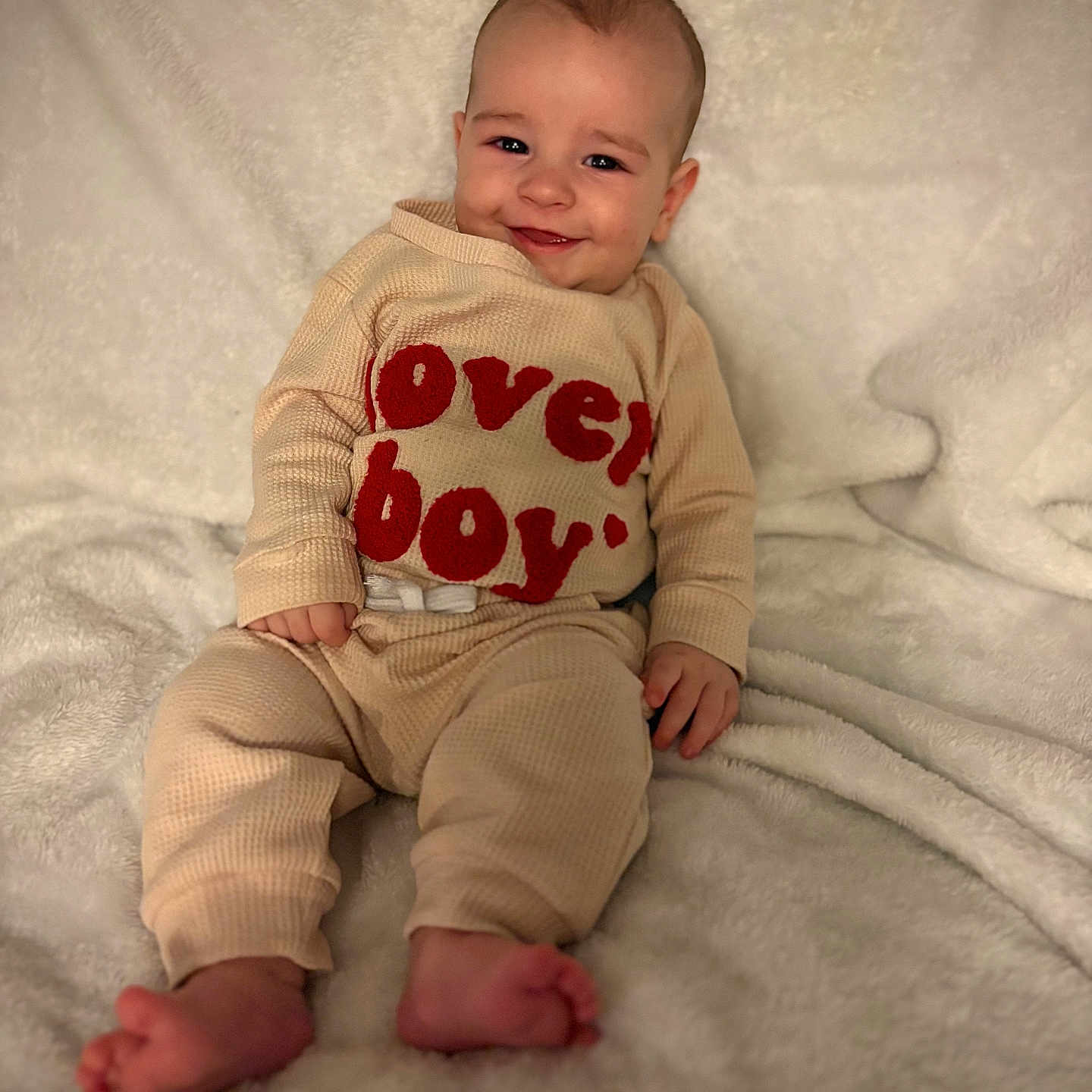 Dayton Jr joined the competition — help win amazing prizes! baby, blanket, bokeh, cheeks, cozy, cute, eyes, feet, hands, happy, indoor, infant, lying_down, photography, portrait, skin, smiling, soft_texture, sweater, text_on_clothing