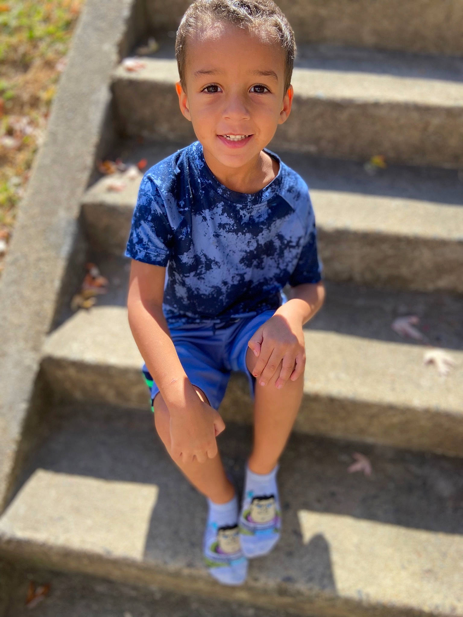 Karson is registered to the contest to win money with this photo: baby_toddler_clothing, child, cool, electric_blue, eye, face, flash_photography, footwear, fun, happy, head, human_leg, joy, leisure, neck, person, recreation, sleeve, smile, summer