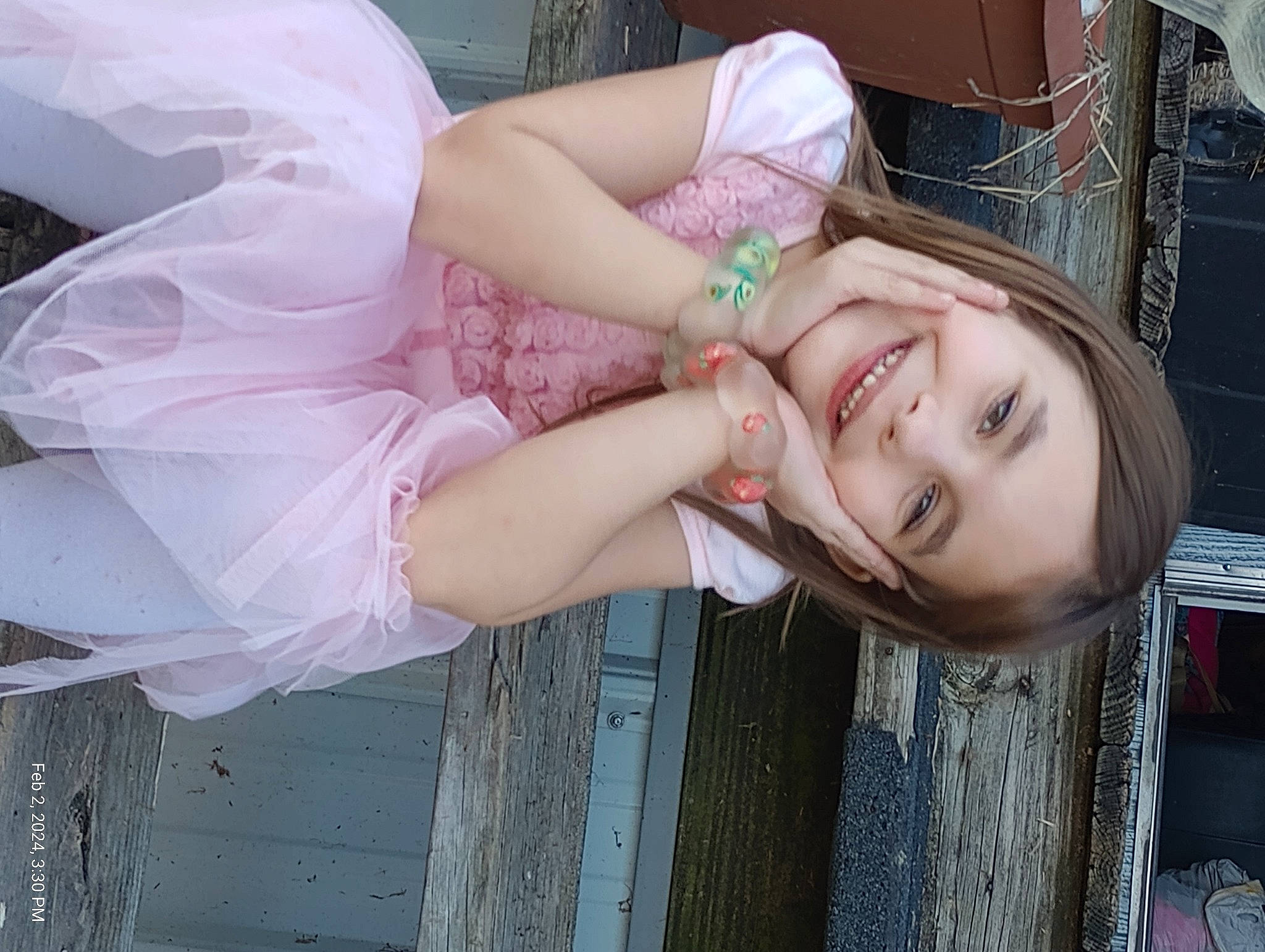 Kaydence is registered to the contest to win money with this photo: bridal_accessory, child, dress, event, eyelash, fashion_accessory, flash_photography, fun, gesture, happy, headpiece, human_leg, jewellery, joy, pattern, person, pink, skin, smile, summer