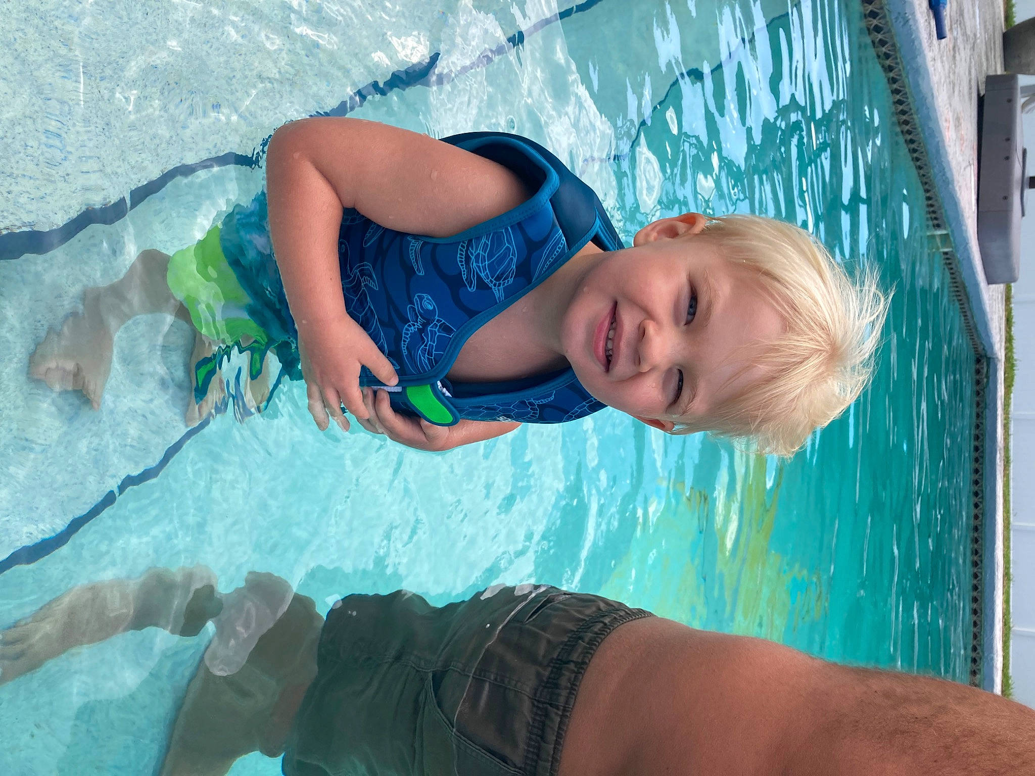 Canaan is registered to the contest to win money with this photo: aqua, azure, blue, body_of_water, child, face, facial_expression, flash_photography, fun, green, hairstyle, happy, joint, joy, leisure, muscle, people_in_nature, person, recreation, skin