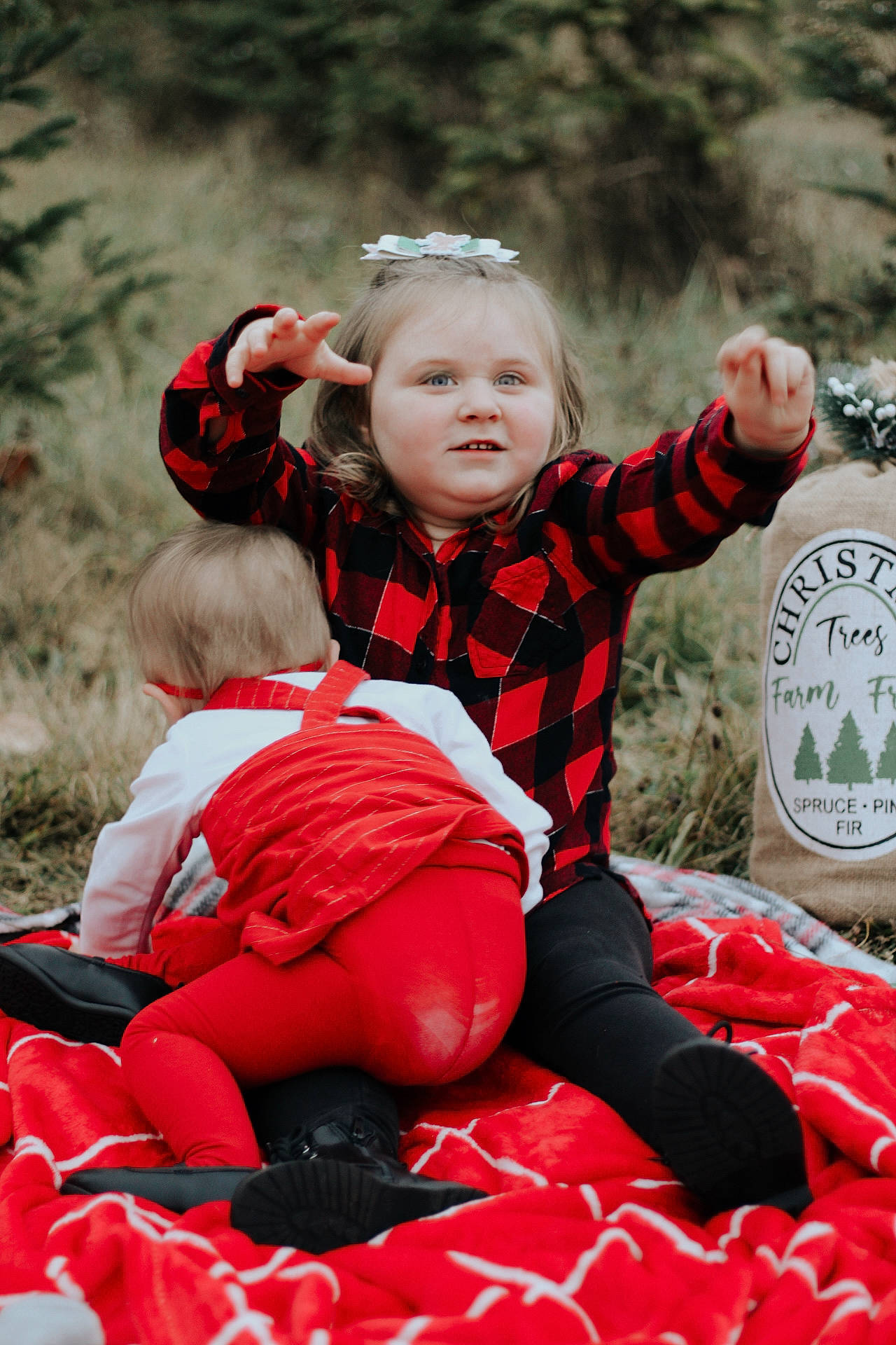 Lexi joined the competition — help win amazing prizes! baby, baby_toddler_clothing, ball, child, event, facial_expression, flash_photography, fun, grass, happy, head, leisure, people_in_nature, person, pink, plant, recreation, red, sitting, toddler