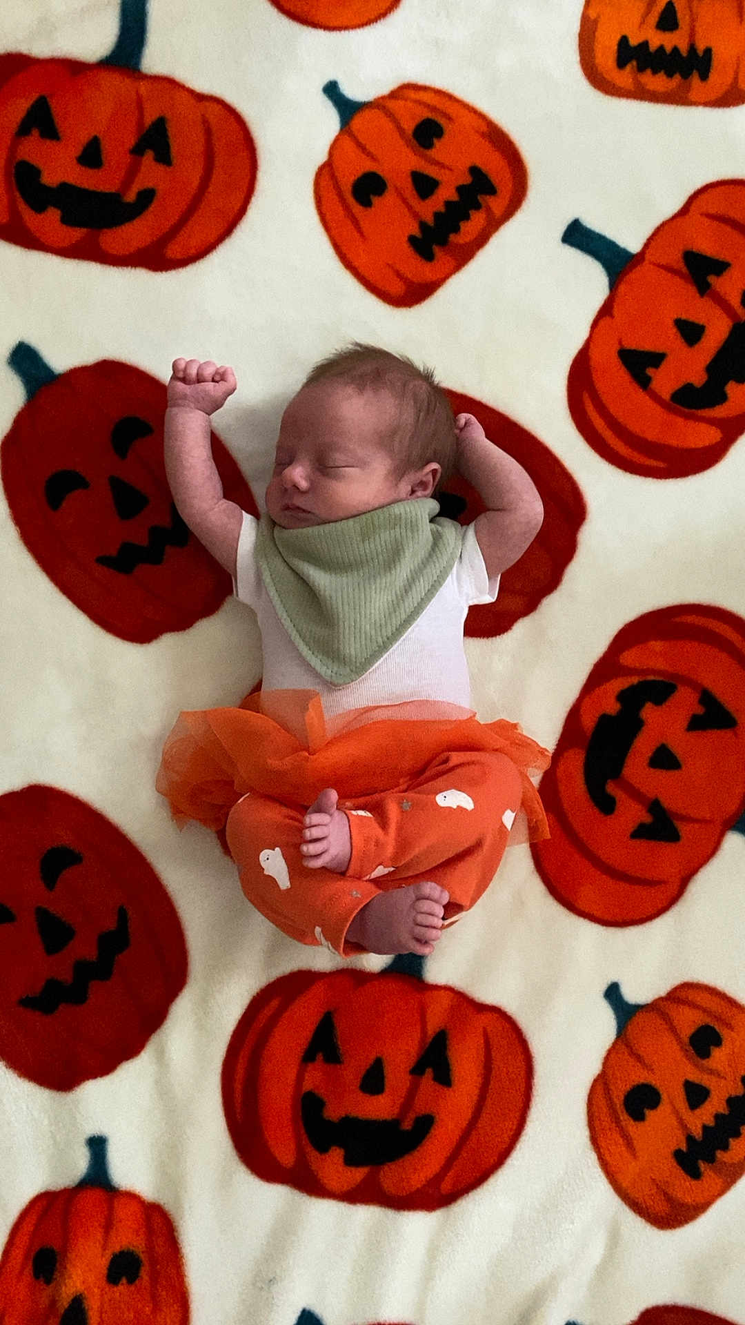 Adalynn joined the competition — help win amazing prizes! newborn, baby, sleeping, orange, halloween, pumpkin, blanket, cute, infant, clothing, footwear, pattern, face, person, toddler, cozy, festive, fall, holiday, soft