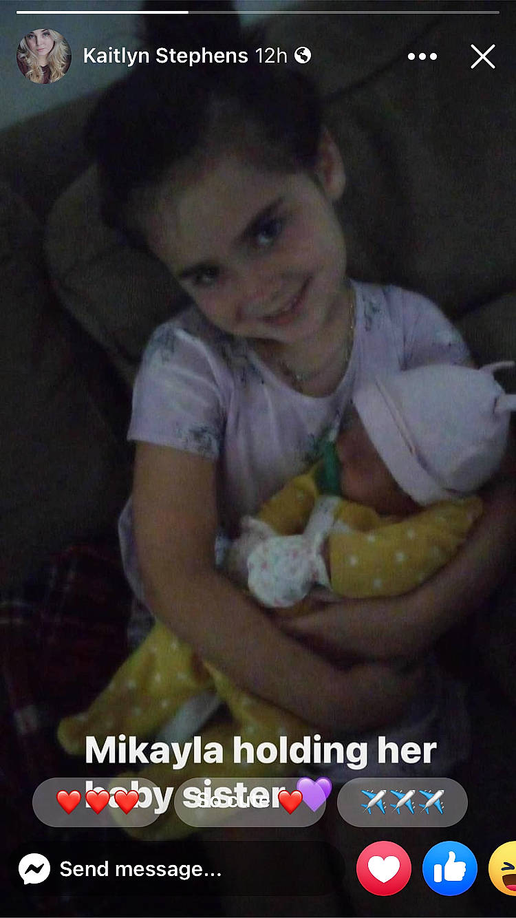 Mikayla is registered to the contest to win money with this photo: arm, baby, baby_products, baby_toddler_clothing, cheek, child, comfort, fun, happy, joy, lap, person, photo_caption, play, room, sitting, smile, thigh, toddler, toy