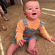 Cyrus is registered to the contest to win money with this photo: animal, baby, bodypart, canine, clothing, crawling, dog, door, face, finger, happy, head, jeans, pants, person, pet, photography, portrait, shorts, sitting