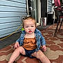 Evangeline joined the competition — help win amazing prizes! toddler, child, denim_jacket, outdoor, rug, pattern, curious, sitting, barefoot, shorts, pony_tail, blue_eyes, porch, door, chair, floor, expression, clothing, person, daylight