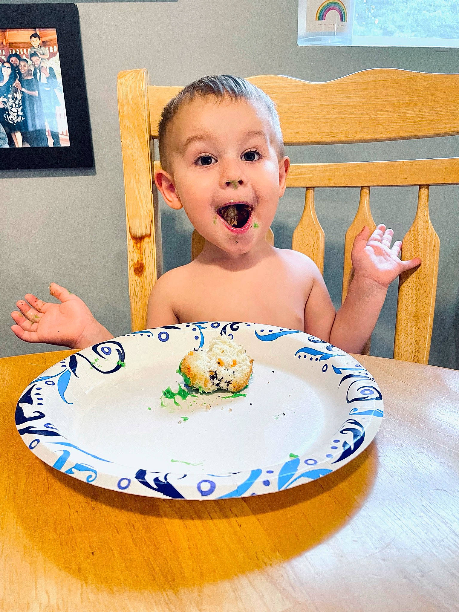 Princeton is registered to the contest to win money with this photo: baked_goods, cake, cake_decorating, cake_decorating_supply, chair, cuisine, dish, dishware, facial_expression, food, ingredient, person, picture_frame, plate, porcelain, serveware, smile, sugar_cake, surprise, table