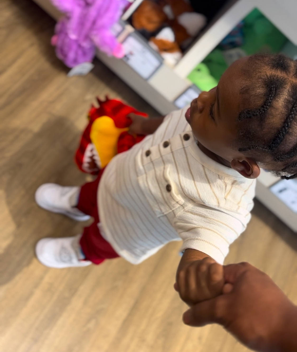 Kayden joined the competition — help win amazing prizes! baby, baby_toddler_clothing, child, finger, floor, flooring, foot, fun, hardwood, human_leg, laminate_flooring, person, room, sitting, sleeve, sock, thumb, toddler, varnish, wood