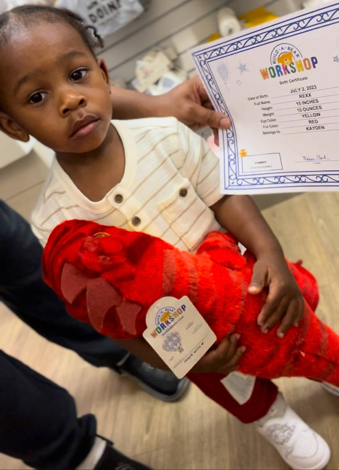 Kayden joined the competition — help win amazing prizes! baby, baby_toddler_clothing, carmine, child, finger, flesh, fun, gesture, happy, person, personal_protective_equipment, room, stuffed_toy, t_shirt, thumb, toddler, toy, vegetable