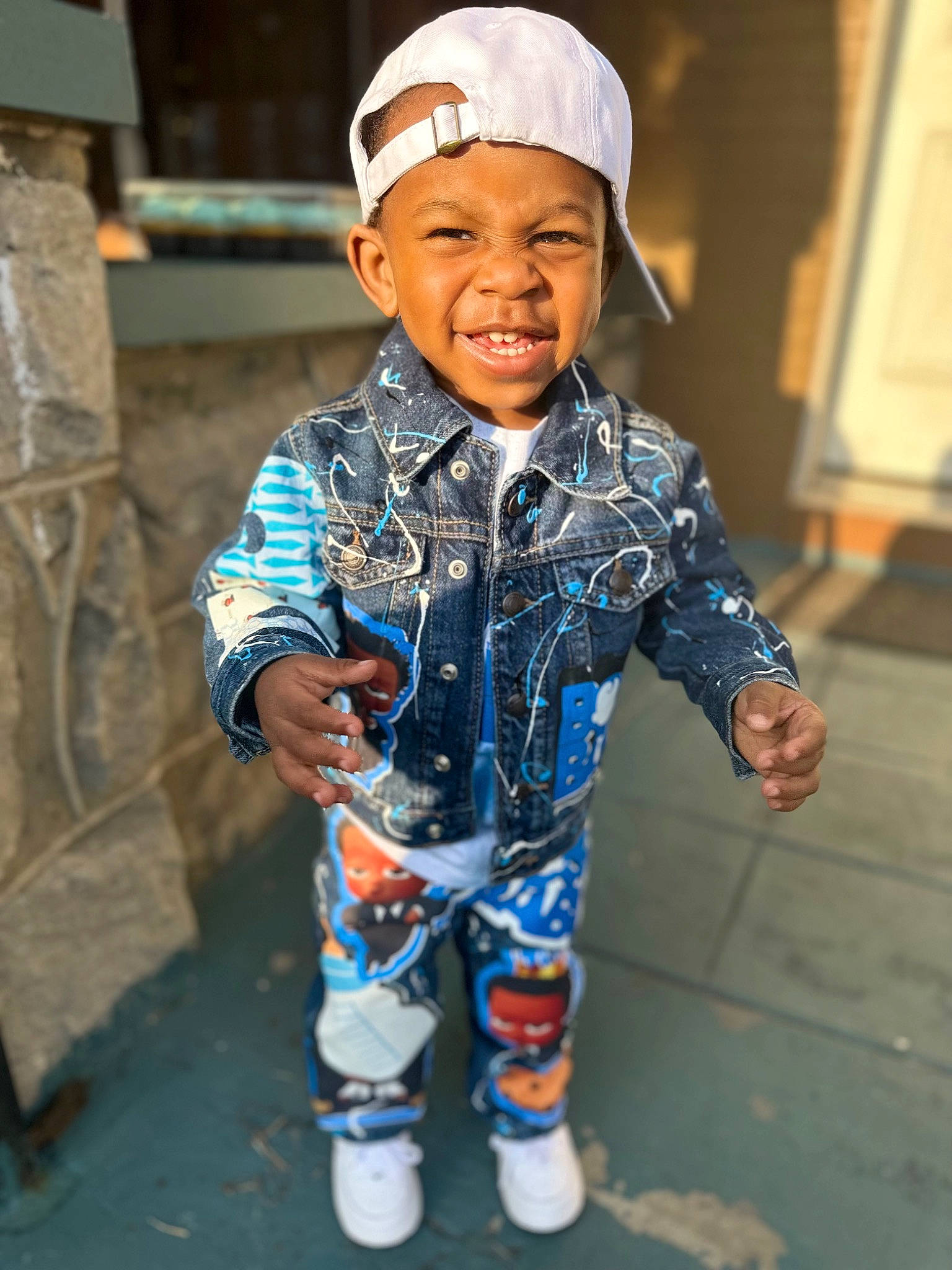 Kayden joined the competition — help win amazing prizes! baby, baby_toddler_clothing, cap, child, costume, electric_blue, eye, face, fashion_accessory, fun, happy, headwear, pattern, person, personal_protective_equipment, portrait_photography, sitting, sleeve, smile, toddler