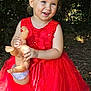 Emilie participe au concours pour gagner de l'argent avec cette photo : blond_hair, child, cute, doll, fun, girl, grass, happy, nature, outdoor, person, playful, portrait, red_dress, smiling, summer, sunlight, toddler, toy, young_child