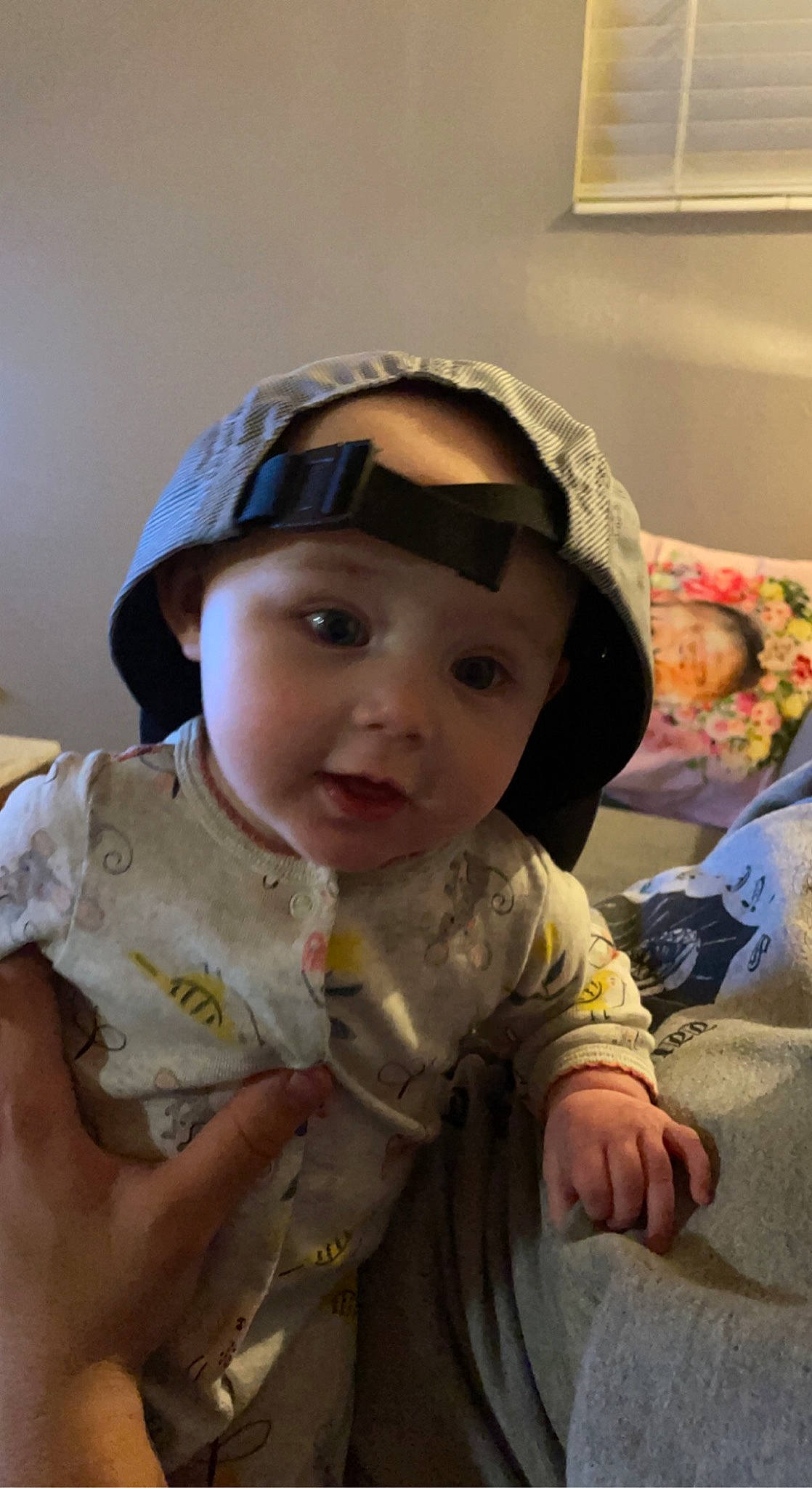 Ramona is registered to the contest to win money with this photo: baby, baby_toddler_clothing, cap, cheek, comfort, eye, eyewear, face, glasses, head, headgear, headwear, iris, lip, mouth, nose, person, skin, sleeve, smile