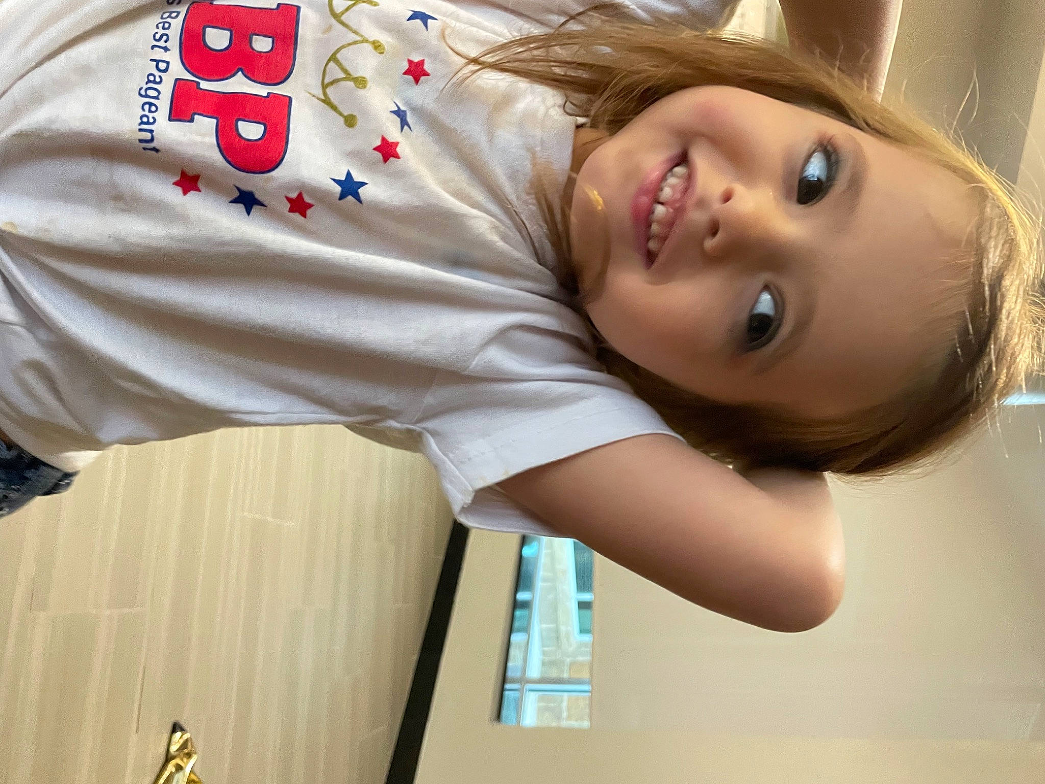 Lindsey joined the competition — help win amazing prizes! arm, baby_toddler_clothing, carmine, chest, child, elbow, eyelash, fun, happy, human_body, joy, nose, person, portrait_photography, room, sleeve, smile, t_shirt, toddler