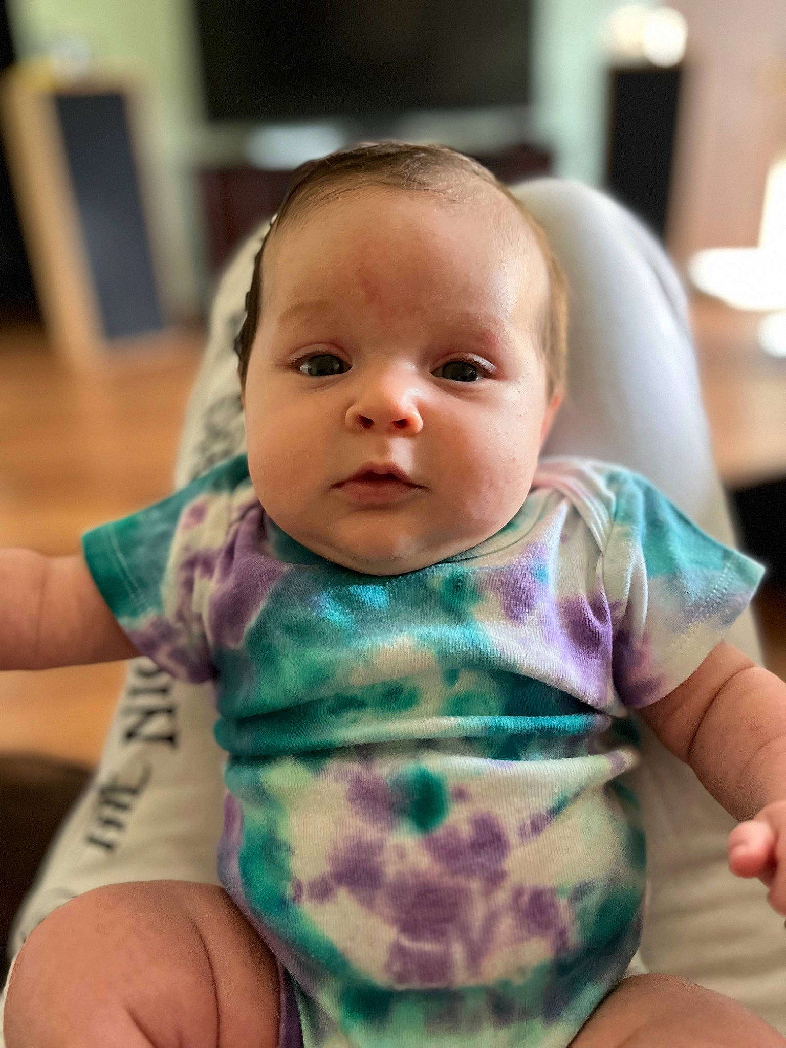 Everly is registered to the contest to win money with this photo: baby, baby_toddler_clothing, cheek, child, chin, collar, comfort, eyebrow, face, finger, gesture, head, iris, lip, mouth, neck, nose, person, skin, sleeve