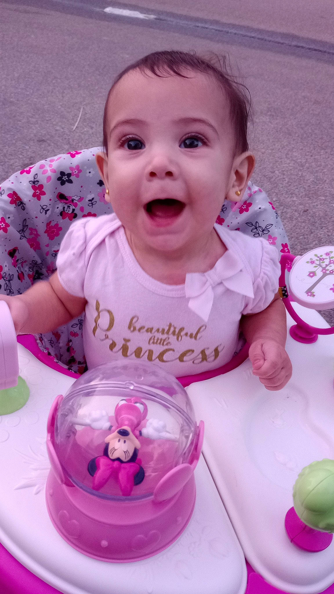 Lilly is registered to the contest to win money with this photo: baby, baby_toddler_clothing, beauty, bib, cheek, child, drinkware, event, facial_expression, fun, happy, magenta, person, pink, purple, skin, sleeve, smile, surprise, t_shirt